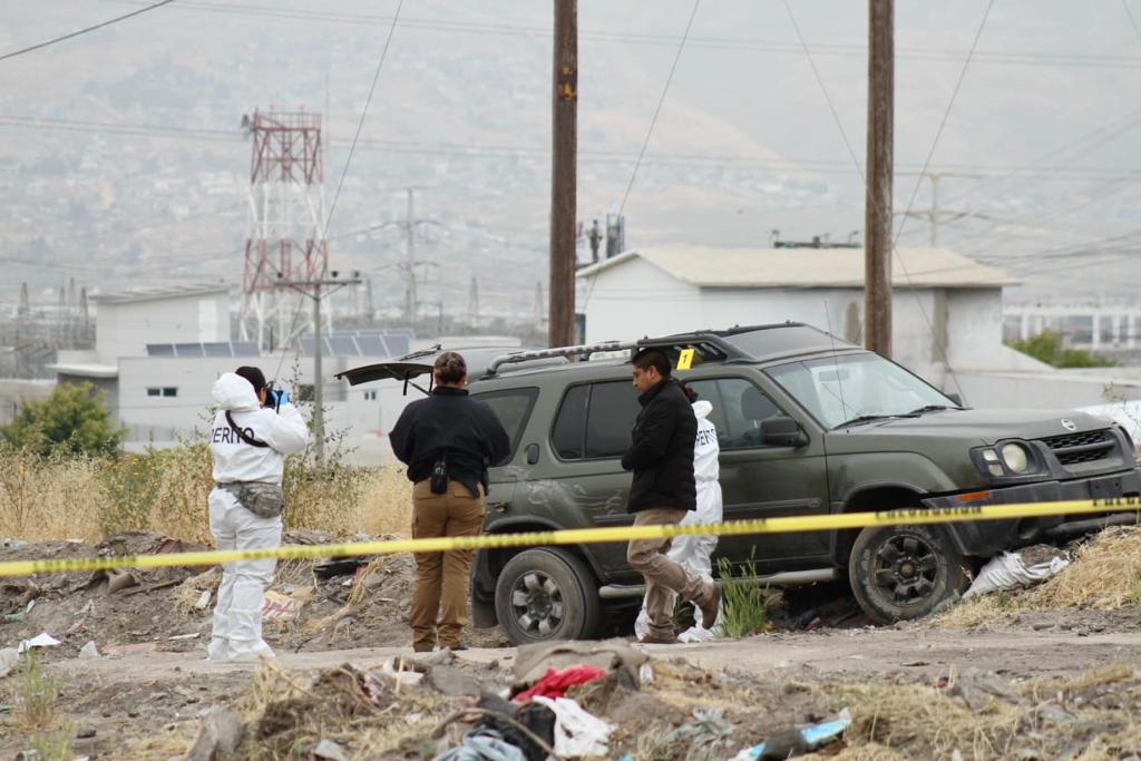 Localizan cuerpo envuelto en una cobija